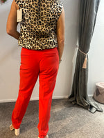 Red tailored trousers