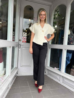 ASYMMETRIC GOLD BUTTON KNITTED TOP