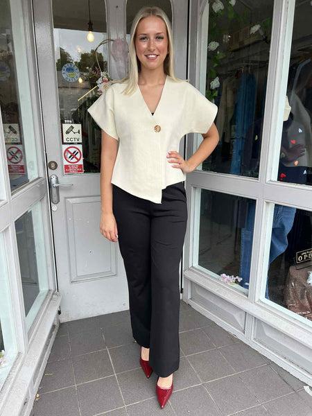 ASYMMETRIC GOLD BUTTON KNITTED TOP